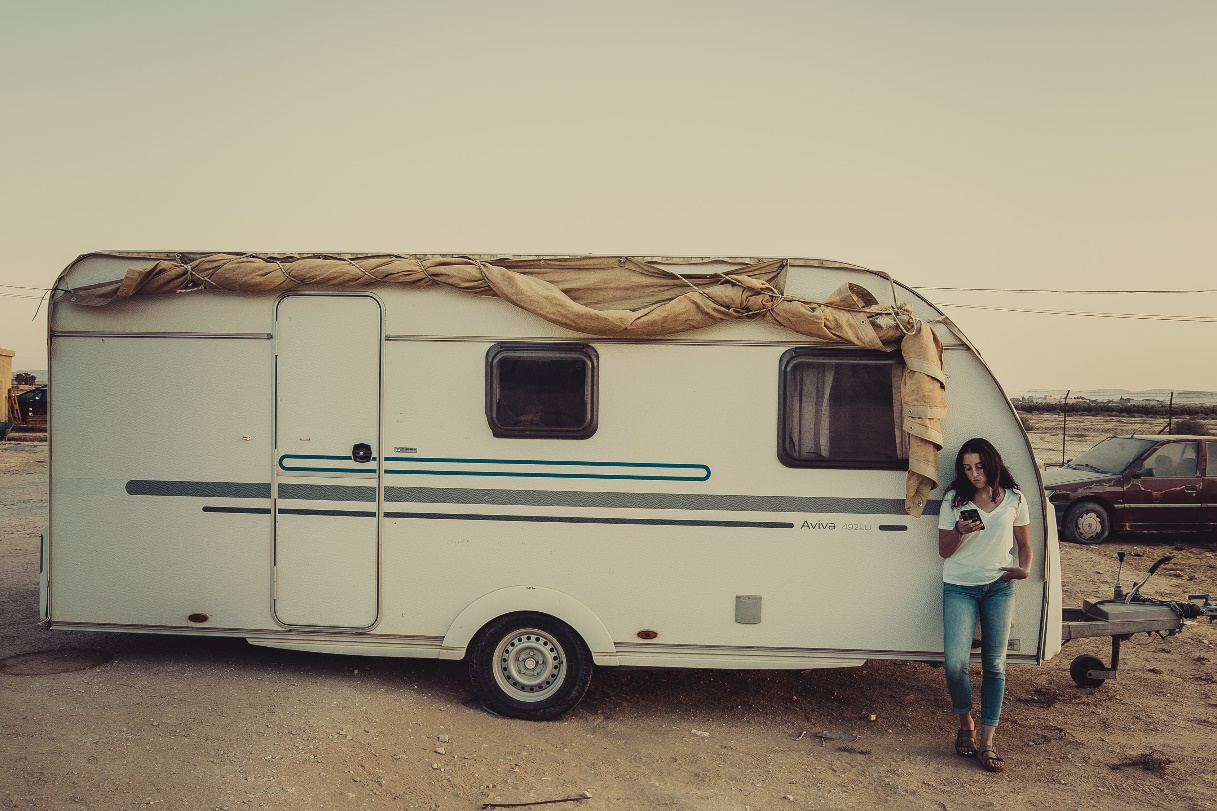 white-RV-recreational-vehicle-woman